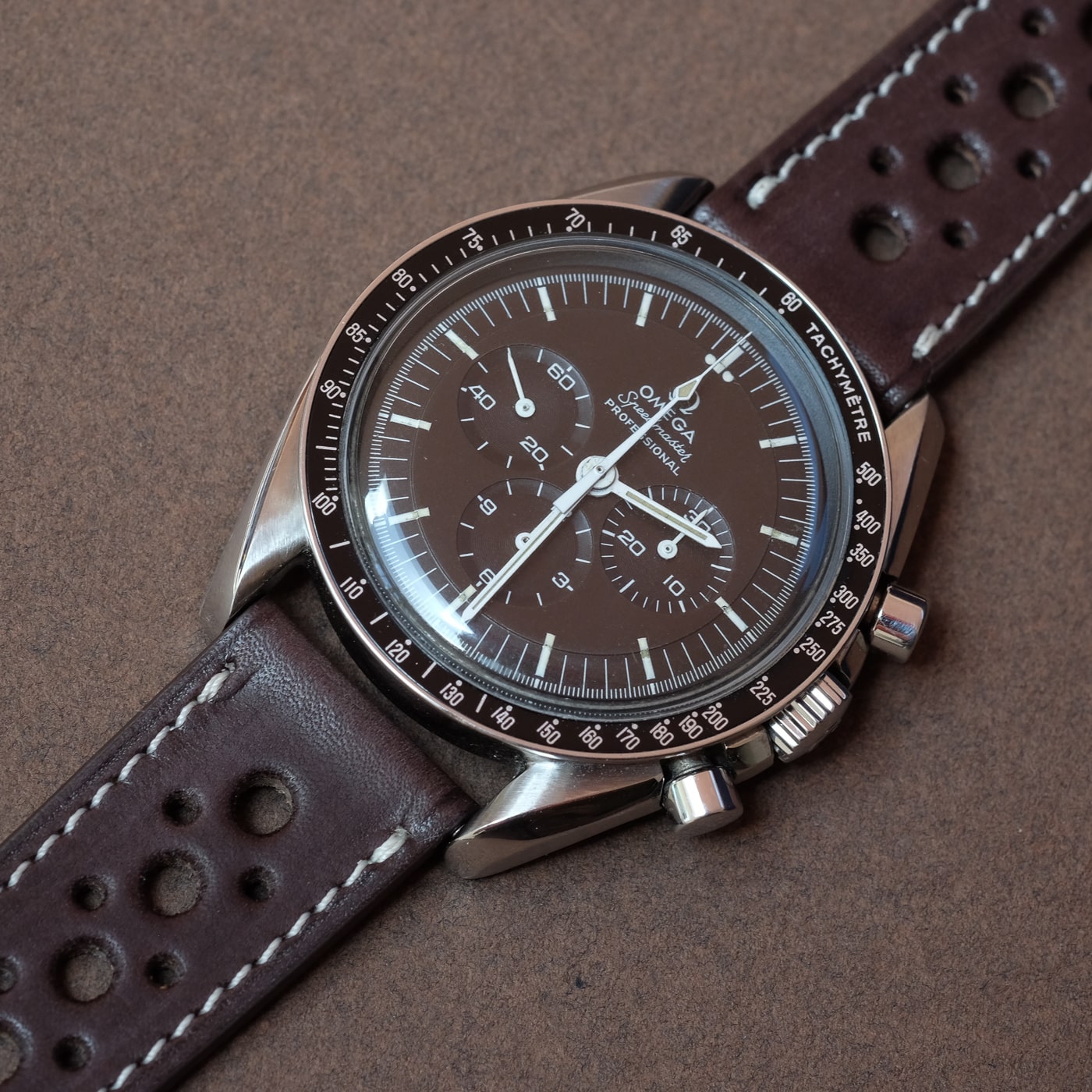 omega speedmaster with brown leather strap